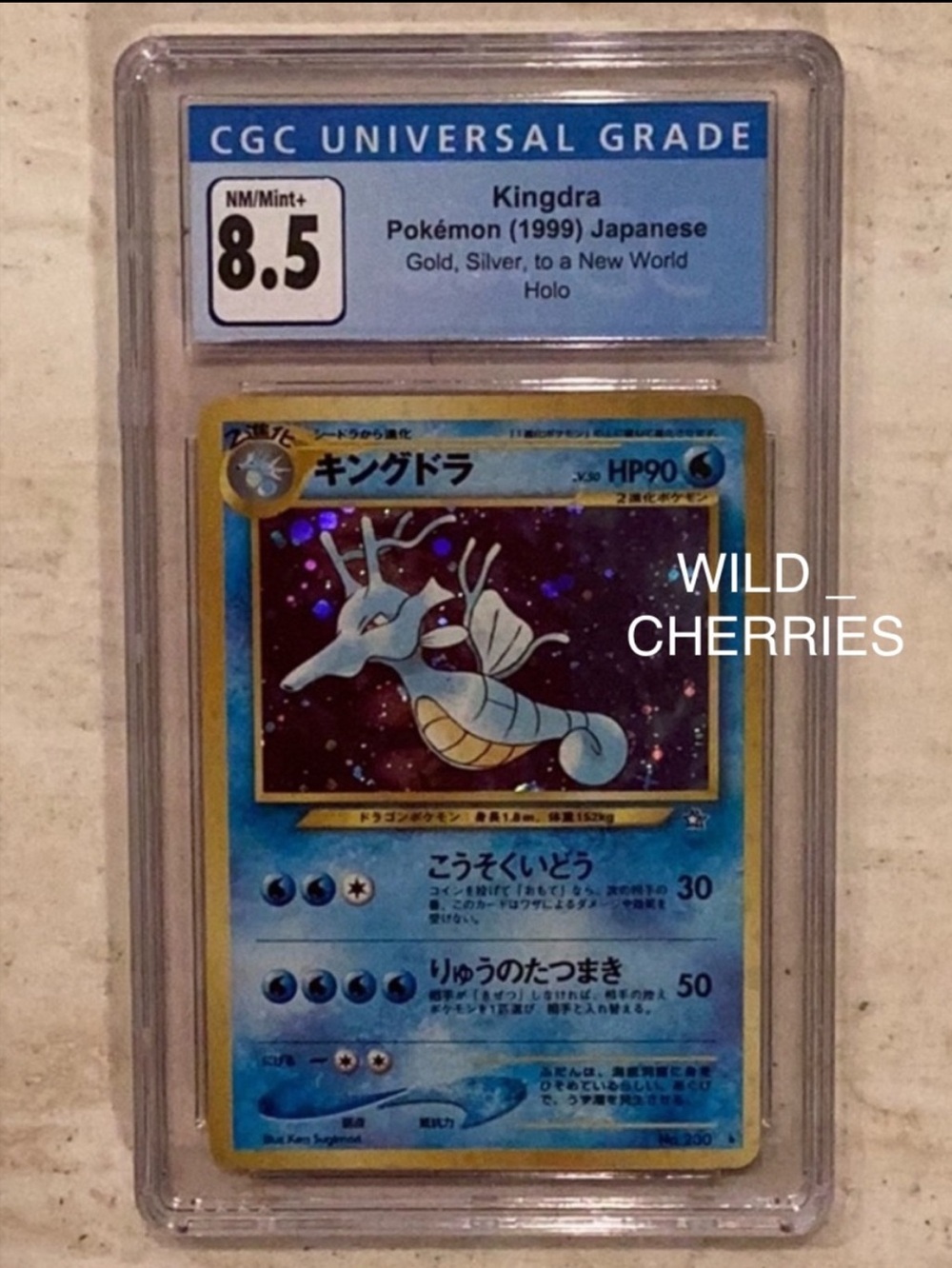 Kingdra 1999 Japanese No 230 Holo Pokemon Gold Silver To A New World CGC 8.5 TCG